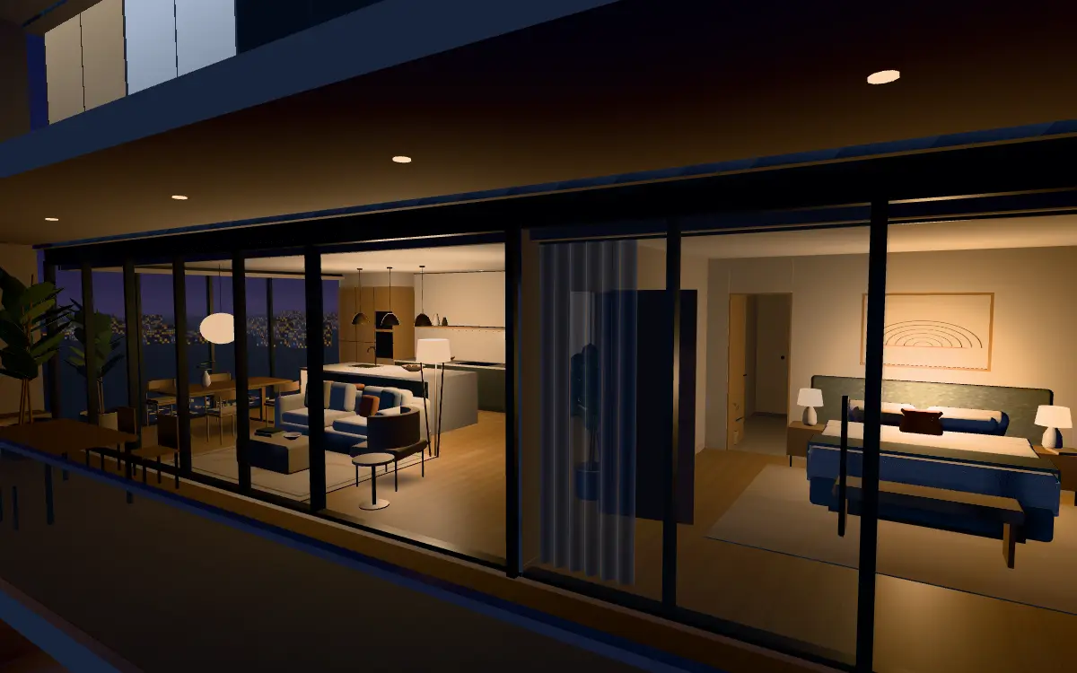 The show apartment at night, seen from the balcony, with its lamps on
