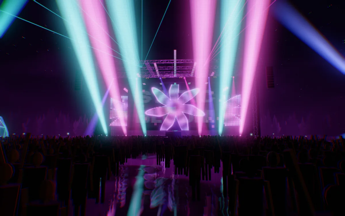 The crowd in front of the main stage, lit by moving lights