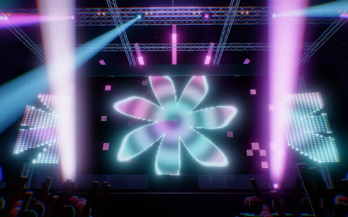 The Bloom Stage from the barrier: the LED wall, the fan of LED petals and the moving lights